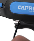 Close-up of Automatic Wire Stripper And Cutter With Narrow Profile For Tight Spaces, gripping a wire, blue/black handle visible