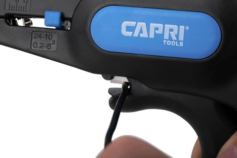 Close-up of Automatic Wire Stripper And Cutter With Narrow Profile For Tight Spaces, gripping a wire, blue/black handle visible