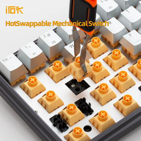 Hot swappable switch being removed from Compact 60 Percent Wired Mechanical Keyboard With Full Metal Chassis And Hot Swappable Red Switches Providing Customizable Rgb Lighting For Pc Gamers Wanting A Straight Durable Rig Upgrade That Is Totally Dialed In.