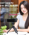 Person using One-Click Opening Vlogging Tripod With Quick-Release System, Cold Shoe Mount, for Sony camera on tabletop