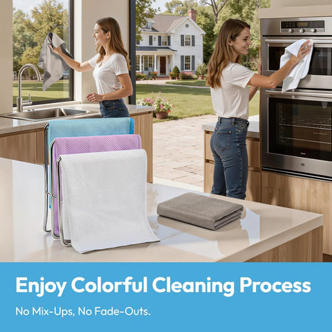 Front view: Six-pack microfiber cleaning cloths, 12x12, white with blue and purple accents on a metal rack in a kitchen.