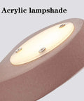 Slick Modern LED Wall Sconce For Living Room And Bedroom Featuring Solid Iron Frame With Smooth Acrylic Shade No Hassle Wall Mount Setup For Chill Ambient Lighting And A Total Room Vibe Upgrade Bronze Large close-up of smooth acrylic lampshade.