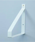 Solid As A Rock Heavy Duty Metal Corner Brackets, Wall Mounted Triangular Shelf Braces With Classic Retro Floating Look, white metal bracket on a wall.