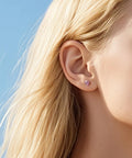 Heart Birthstone Screw Back Earrings Made From Implant Grade Titanium With Super Snug Fit And Truly Hypoallergenic Nickel Free Metals For Daily Grind Featuring Five mm Gem Hearts, worn close-up on ear.