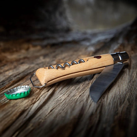 Killer Stainless Steel Folding Pocket Knife With Integrated Wine Corkscrew And Bottle Opener Solid Beechwood Handle on wooden surface.