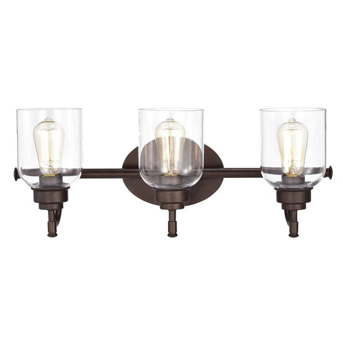 Adair 3 Light Bath Vanity Light In Oil Rubbed Bronze With Clear Glass Bell Shades 24 Inch Wide Transitional Indoor Fixture For Up Light And Down Light Perfect For Any Bath Update, front view