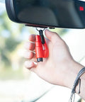 Hand holding 2 In 1 Emergency Car Escape Tool Keychain Hammer With Seatbelt Cutter And Window Breaker, Compact Red Lifesaver