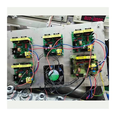 PCB driver boards set up for testing with wiring, part of High Power 40KHz Ultrasonic Cleaner Kit for PCB Driver Boards and Circuit Boards With 60W Transducer, Pro Grade Cleaning for Soldering Prep, Safe Degassing, and Ready-to-Build Board Pack.