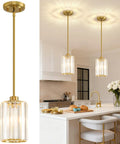 Top Shelf Modern Gold Pendant Lights 2 Pack Adjustable Crystal Chandelier Kitchen Island Fixture above a white kitchen island.