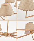 Close-up of the 39 Inch Boho Rattan Chandelier With Six Warm Bulbs showing handwoven rattan shades and brass rods.