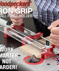 Zero Drama Small Parts Holder For Router Tables with aluminum frame, clamps, and precision stop pins in use.