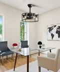 20 Inch Industrial Cage Ceiling Fan with 7 ABS Blades hanging in a bright dining area with modern decor.