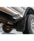 Round Magnetic Parts Tray With Heavy Duty Magnet Stainless Steel Workbench Organizer attached under a vehicle.