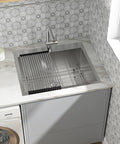 Drop-in stainless steel utility sink, 25x22 inches, 12-inch depth, single bowl with metal draining rack and modern faucet.
