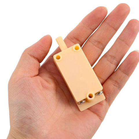 Tamper Switch For Security Cabinets With Screw Terminal Contact Sensor Plastic And Metal Enclosure Alarm For Industrial Facilities And Warehouses Alerts Unauthorized Access And Provides Easy Mounting, hand-held beige plastic switch