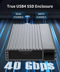 Zero Hassle Usb 4 M2 Nvme Ssd Enclosure With Toolless Build And Up To Forty Gigabit Transfer Speeds For Lightning Quick File Swaps Across All Your Gear, grey aluminum design, showing connection ports and speed indicators.
