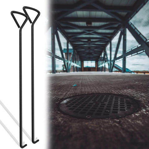 Two Piece 80 Centimeters Manhole Hook Lifter Set next to manhole cover on pavement.