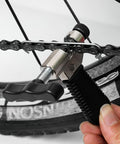 Close-up of Bike Chain Repair Tool Set With Chain Breaker Splitter For Easy Quick Fix On The Go Premium Hardened Steel Chain Tool in use