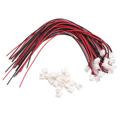 Premium XH2.54 2 Pin Male Female Wire Connector Kit Featuring Drop Dead Simple Pitch Matching And Heavy Duty Tinned Copper Jumpers For Quick Electronics Setup And Slick Builds with red and black wires and white connectors.