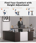 Upgrade Your Daily Grind With This Premium Executive Standing Desk Featuring Smooth Dual Electric Motors Four Memory Presets And Secure Storage L Shaped Khalba Oak Design with a person and child using it.
