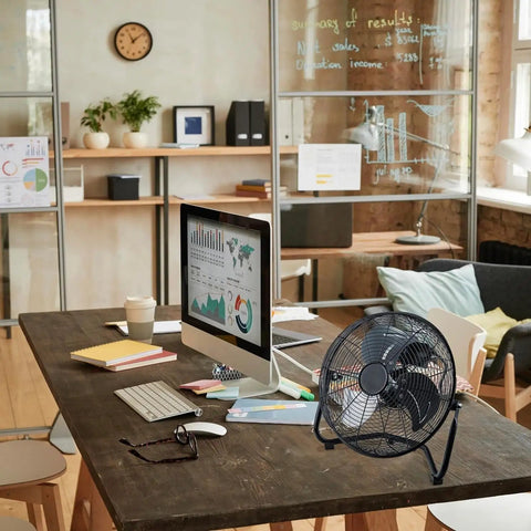 12-Inch Cradle Floor Fan With 3-Speed High-Velocity Airflow, 180-Degree Tilt, All-Metal Build, Black, on office desk