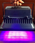 Rock Solid 600W Led Uv Curing Lamp Delivering 365Nm 395Nm 405Nm Wavelengths For Sla Dlp 3D Printer Resin Pcb Repair Gel Nails And Weekend Craft Projects Fast Dry Action held by hand with purple UV light