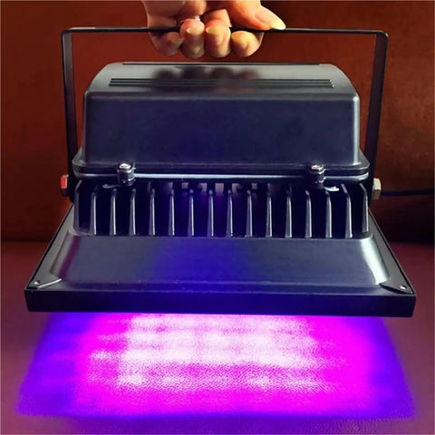 Rock Solid 600W Led Uv Curing Lamp Delivering 365Nm 395Nm 405Nm Wavelengths For Sla Dlp 3D Printer Resin Pcb Repair Gel Nails And Weekend Craft Projects Fast Dry Action held by hand with purple UV light
