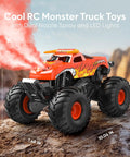 Waterproof Monster Truck Toy 1 To 16 Scale Amphibious Remote Control Car with spray and LED lights on rocky terrain