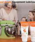 Family using food grade lubricant for kitchen gear with green stand mixer; odorless PTFE grease safe for incidental food contact, 1 oz