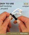 Close-up of hands using self-locking lanyard from Beefy Heavy Duty Zip Ties 12 Inch Black 1000 Pack With 100 Pound Tensile Strength For Indoor Outdoor Industrial Use UV Resistant Weatherproof Nylon Tie Wraps Great For Cable Management And Quick Tidy Up.