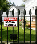 Dog On Premises Warning Sign Rugged 8x12 Inch Metal Yard Gate Decor on black fence with dog in backyard