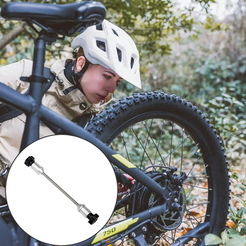 Cyclist with Universal Bicycle Thru Axle Adapter For Truing Stands, Aluminum Alloy Hub Repair Tool highlighted.