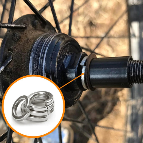 Side view of bicycle hub with a stainless steel split lock washer installed; inset shows 1100-pc M2–M12 lock washer kit.