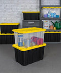 Heavy Hitter Heavy Duty Storage Totes With Secure Lids For Garage, 27 Gallon Stackable Plastic Bins 8 Pack with yellow lids.