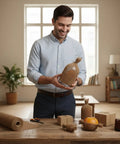 Man using Extra Wide Honeycomb Packing Paper For Moving 15 By 131 Inches 80 GSM Eco Friendly Cushioning with packed items.