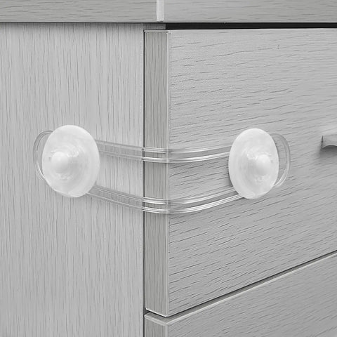 4 Pack Kid Proof Cabinet Locks For Drawers And Furniture, flexible adhesive strips, no drilling, strong hold, white safety locks in use