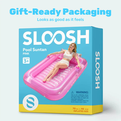 Box of Inflatable Tanning Pool Lounger With Pillow 70 By 46 Inches Personal Water Filled Float For Backyard Chill in pink.