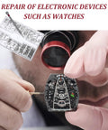 Close-up of a watch repair using 500Pcs Eyeglass Repair Kit With Tiny Micro Screws And Phillips Screwdriver.