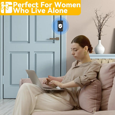 Woman using laptop in a room with Heavy Duty Door Reinforcement Lock for Inward Swinging Doors installed on the door.