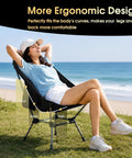 Person relaxing in Big And Roomy Portable Camping Chair With A 24 Inch Wide Seat Ultralight Foldable For Backpacking Hiking And Beach Trips