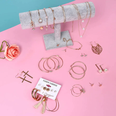 Must Have 38 Piece Jewelry Set For Women With Four Necklaces Ten Bracelets And Twenty Four Layered Ball Hoop Earrings Lightweight Alloy Fashion Jewelry For Everyday Glam Eco Friendly And Colorfast Gift Ready displayed on pink background