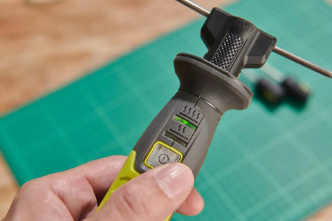 Close-up of the handle of a 4V Cordless Hot Foam Cutter With 2.0Ah Battery, showcasing heat settings for model making.