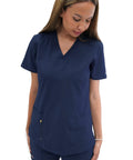 Womens Five Pocket V Neck Scrub Top For Medical Bosses Straight Fire Navy Nursing Uniform Featuring Relaxed Stretch Fabric, model showing top.