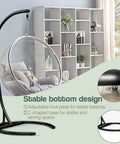 Heavy Duty Hammock Chair Stand Only 360 Degree Rotation C Frame, black steel base with hanging egg chair in modern room.