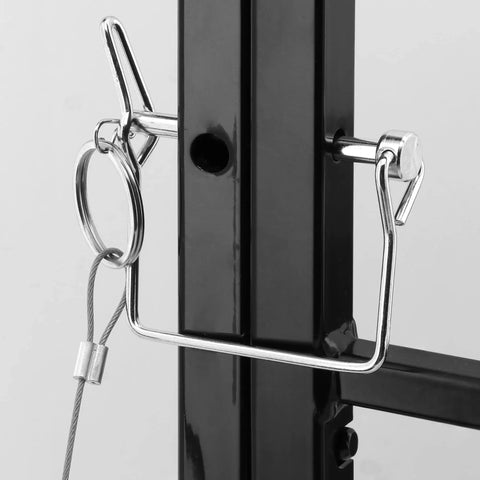 Close-up of quick release mechanism on 21 Inch White Painted Carbon Steel Hinged 4 Bar Window Grill With Quick Release Inside Frame Mount For Easy Emergency Removal And Durable Home Window Security.
