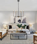 Six Light Farmhouse Chandelier With Adjustable Height Black And Gold Iron Pendant Lighting For Dining Room Kitchen Island Living Room And Foyer Clean Modern Candle Style That Delivers Classic Charm And Everyday Boss Vibe in a modern living room.