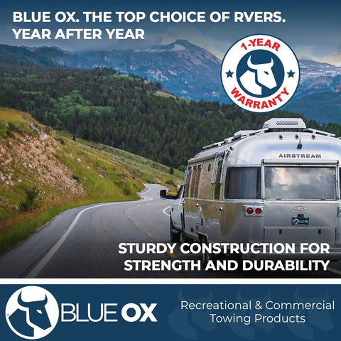 Airstream trailer towed by vehicle on scenic road; focus on Blue Ox Heavy Duty Tow Safety Cable Kit 10000 Lb Rating Seven Foot Length Prevents Accidental Disconnection And Secures Towing Built Tough For Road Ready Confidence Durable Cables Ready For Repeated Use, 1-year warranty graphic.