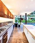 Top Shelf Pro Grade High Gloss Wet Look Concrete Sealer That Really Gonna Make Your Driveway Shine With Hard Hitting Protection And Deep Color Enhancement For A Solid Five Gallon Finish in modern outdoor kitchen with wooden accents.