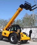 Heavy Duty Telescopic Boom Handler With Smooth Hydraulic Controls High Performance Telehandler Forklift in action with raised forks.