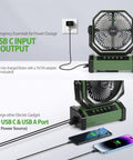 Ultra Powerful 20000mAh Camping Fan With Light And Remote Auto Oscillating Fan Four Timer Modes Up To Sixty Hours Of Cordless Cooling Dual USB Ports To Charge Other Devices Perfect For Travel Outdoors RV Tent And Emergency showing USB ports and device charging